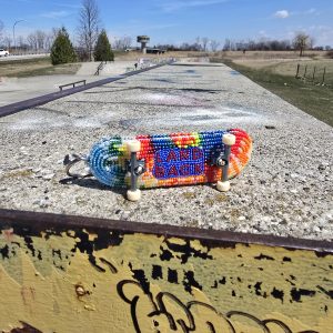 Tie Dye Land Back Beaded Skateboard Keychain